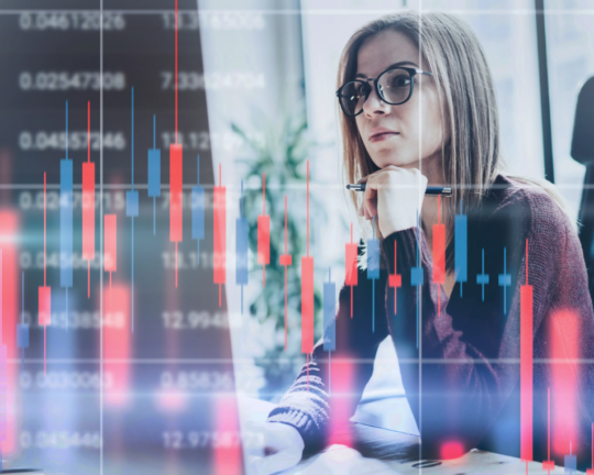 woman looking at graphs